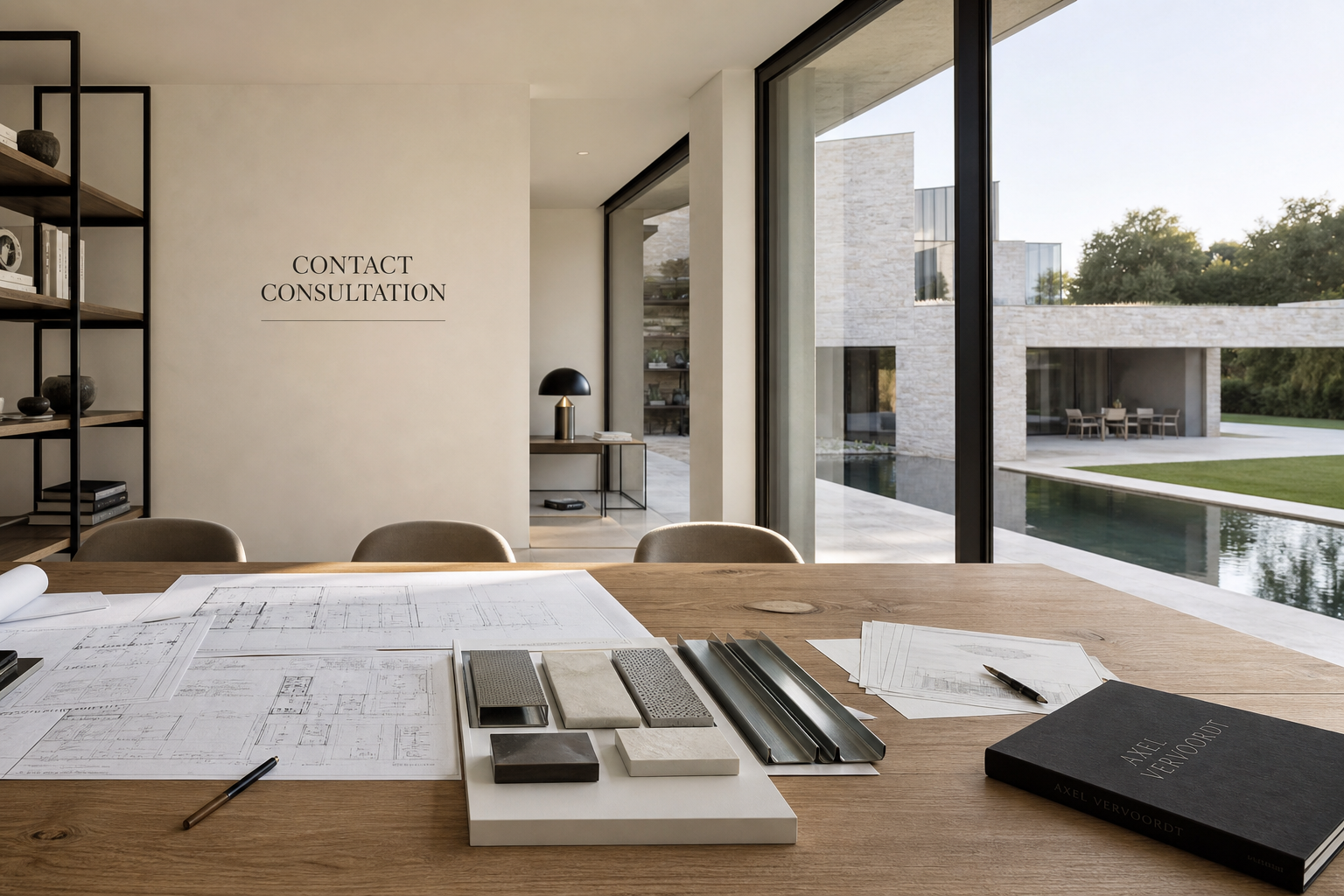 Elegant architectural meeting space with blueprints and material samples overlooking a luxury villa