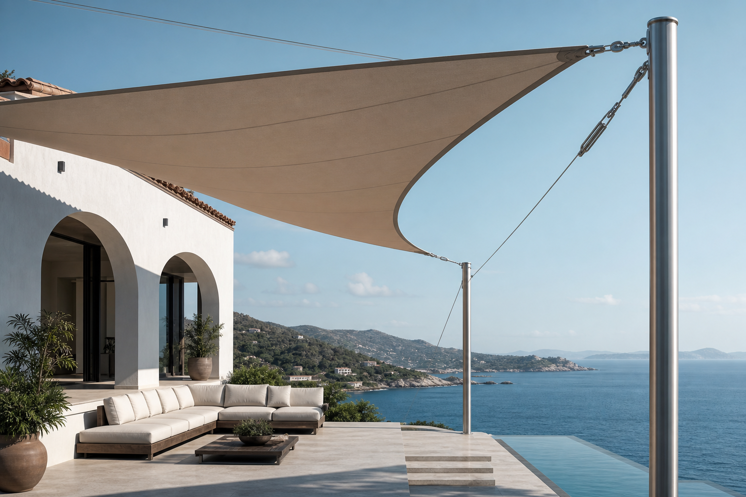 Luxury Mediterranean villa with high-tension architectural shade sails and marine-grade hardware
